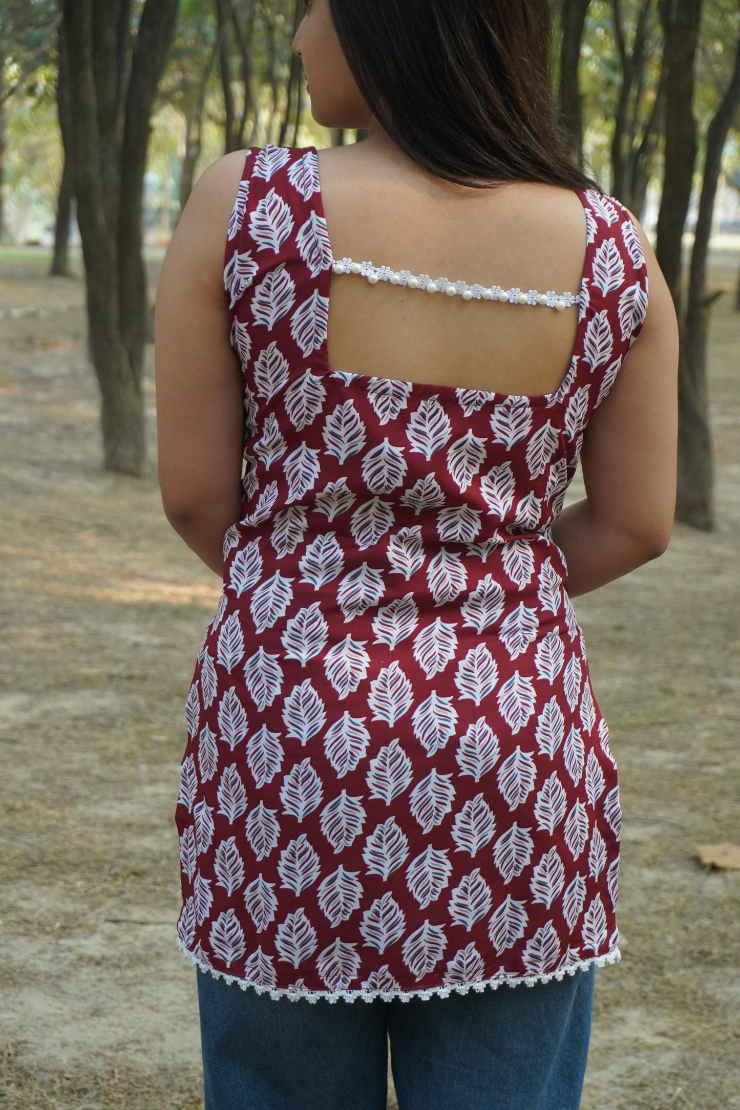 Maroon Leaf Print Sleeveless Short Kurti