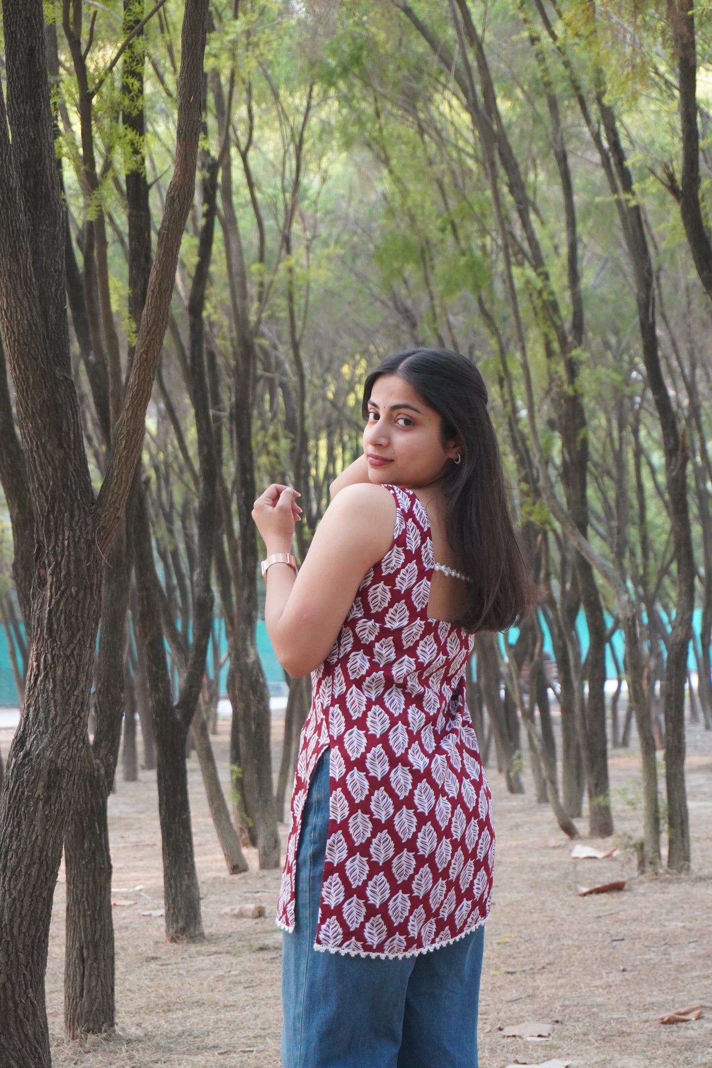 Maroon Leaf Print Sleeveless Short Kurti